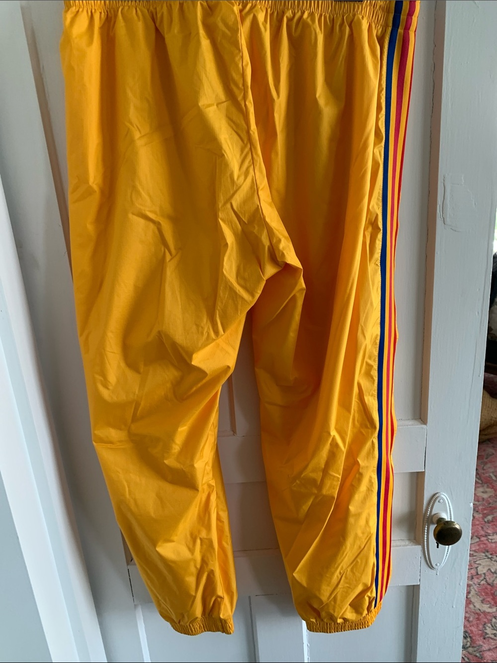 Men’s Yellow adidas Track Pants with Multicolor Trefoil Stripe - Picture 4 of 5